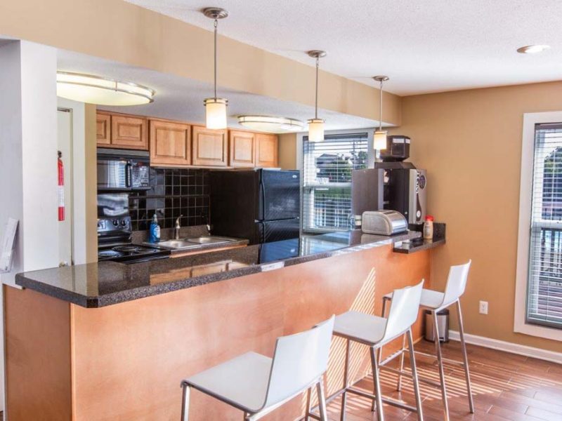 This image shows the ultimate luxury café lounge of TGM Autumn Woods Apartment with stunning coffee machines and an Instagrammable ambiance.